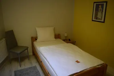 Ein Bett oder Betten in einem Zimmer der Unterkunft Hotel zum Ochsen