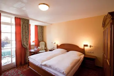 Ein Bett oder Betten in einem Zimmer der Unterkunft Hotel Karpfen