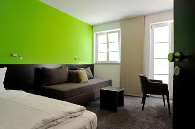 Ein Bett oder Betten in einem Zimmer der Unterkunft Cafe Elisabeth