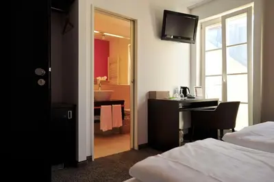 Ein Bett oder Betten in einem Zimmer der Unterkunft Cafe Elisabeth