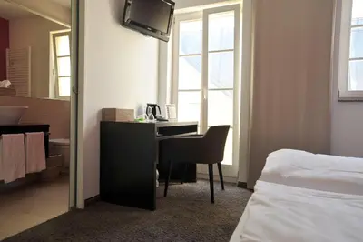 Ein Bett oder Betten in einem Zimmer der Unterkunft Cafe Elisabeth
