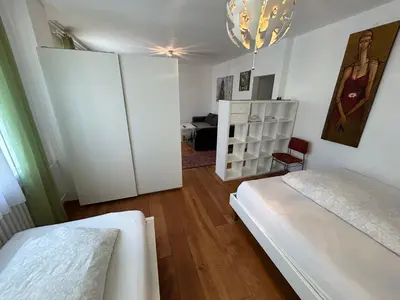 Ein Bett oder Betten in einem Zimmer der Unterkunft Top Apartment Rödermark 2SZ
