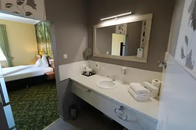 Ein Bett oder Betten in einem Zimmer der Unterkunft Hotel Deutscher Hof