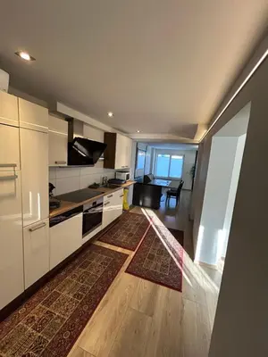 Küche/Küchenzeile in der Unterkunft Exclusiv Apartment 3 Zi Waschmaschine