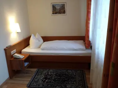 Ein Bett oder Betten in einem Zimmer der Unterkunft Hotel am Exerzierplatz