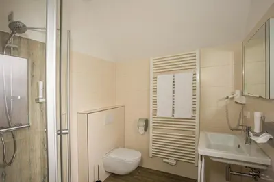 Ein Badezimmer in der Unterkunft Restaurant Grüner Baum