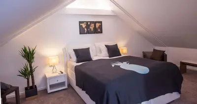 Ein Bett oder Betten in einem Zimmer der Unterkunft BoardingHouse Mannheim
