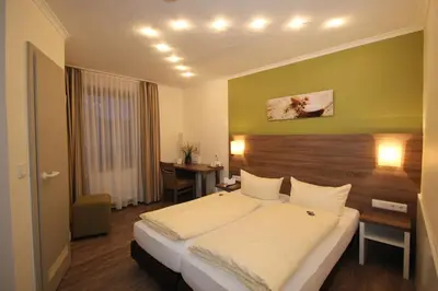 Ein Bett oder Betten in einem Zimmer der Unterkunft Gasthof Weißes Roß