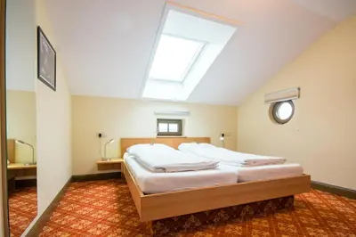 Ein Bett oder Betten in einem Zimmer der Unterkunft Bahnhof Busch