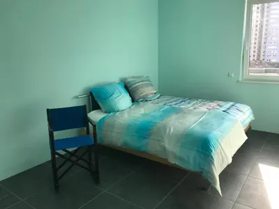 Ein Bett oder Betten in einem Zimmer der Unterkunft The Penthouse
