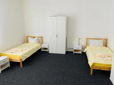 Ein Bett oder Betten in einem Zimmer der Unterkunft Villa Birkenfeld
