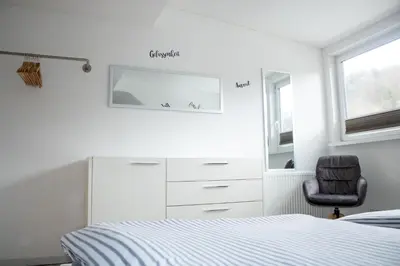 Ein Bett oder Betten in einem Zimmer der Unterkunft Ferienwohnung 1