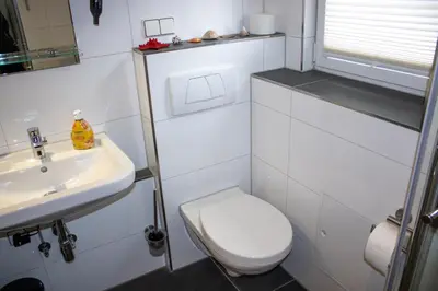 Ein Badezimmer in der Unterkunft Ferienwohnung 1