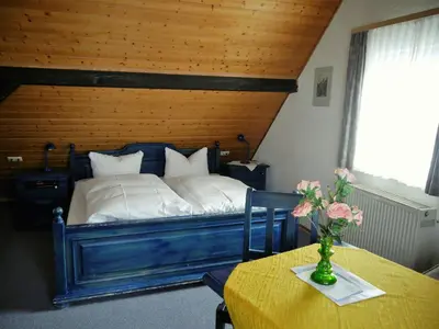 Ein Bett oder Betten in einem Zimmer der Unterkunft Hotel-Gasthof-Destille-Eisenbahn