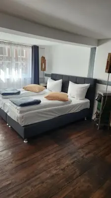 Ein Bett oder Betten in einem Zimmer der Unterkunft Hotel Schmuckkästchen