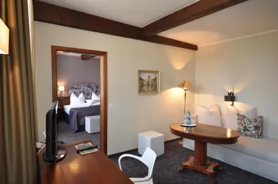 Ein Bett oder Betten in einem Zimmer der Unterkunft Hotel Schmuckkästchen