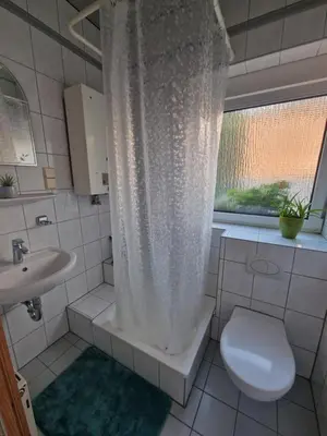 Ein Badezimmer in der Unterkunft Ferienwohnung
