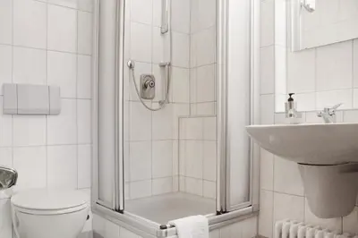 Ein Badezimmer in der Unterkunft Waldhotel Post