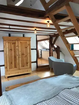 Ein Bett oder Betten in einem Zimmer der Unterkunft Fuxbau