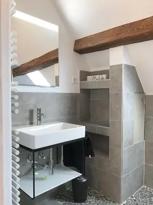Ein Badezimmer in der Unterkunft Fuxbau