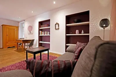 Ein Sitzbereich in der Unterkunft WEINreich, Gästezimmer & Weinstube