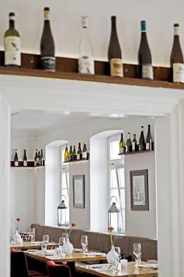Getränke in der Unterkunft WEINreich, Gästezimmer & Weinstube