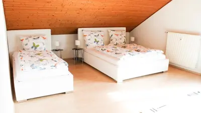 Ein Bett oder Betten in einem Zimmer der Unterkunft Ferienwohnung-Fuchs