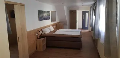 Ein Bett oder Betten in einem Zimmer der Unterkunft Nibelungen - Ferienwohnungen - Worms - Apartments