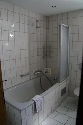 Ein Badezimmer in der Unterkunft Nibelungen - Ferienwohnungen - Worms - Apartments