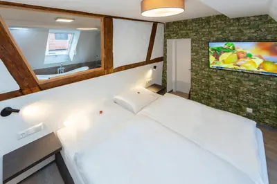 Ein Bett oder Betten in einem Zimmer der Unterkunft Gottwalds Inn