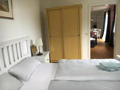 Ein Bett oder Betten in einem Zimmer der Unterkunft Pension Malwine