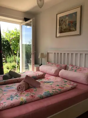 Ein Bett oder Betten in einem Zimmer der Unterkunft Pension Malwine