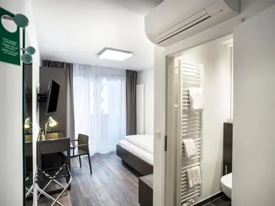 Ein Bett oder Betten in einem Zimmer der Unterkunft Mood contemporary living