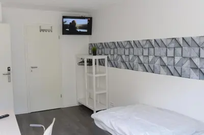 Ein Bett oder Betten in einem Zimmer der Unterkunft Pforzheim Ferienhaus