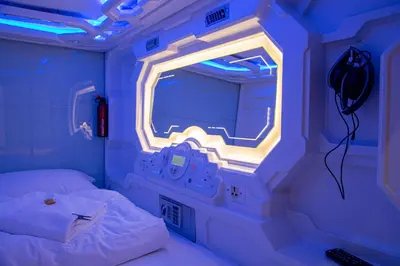 Ein Bett oder Betten in einem Zimmer der Unterkunft Spacehotel Karlsruhe