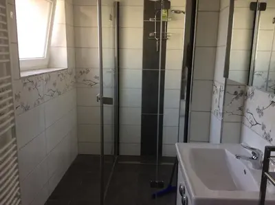 Ein Badezimmer in der Unterkunft URS Ferienwohnung Wertheim
