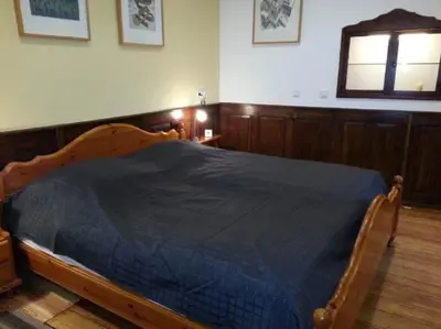 Ein Bett oder Betten in einem Zimmer der Unterkunft Haus Wasmuth - Ferienwohnung DORFPLATZ