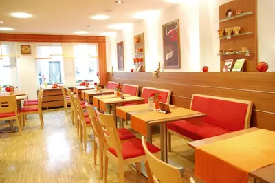 Ein Restaurant oder anderes Speiselokal in der Unterkunft Schell Schokoladen