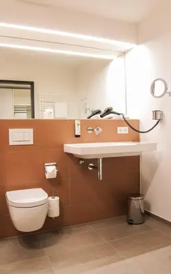 Ein Badezimmer in der Unterkunft SEEGER Living Premium Downtown