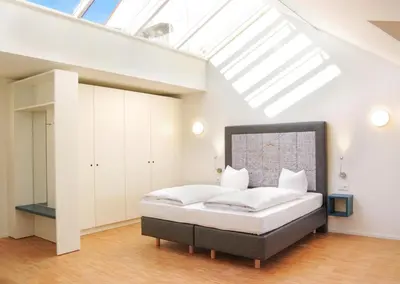Ein Bett oder Betten in einem Zimmer der Unterkunft SEEGER Living Premium Downtown
