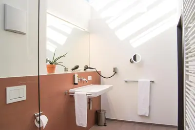 Ein Badezimmer in der Unterkunft SEEGER Living Premium Downtown