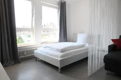 Ein Bett oder Betten in einem Zimmer der Unterkunft SEEGER Living Classic East