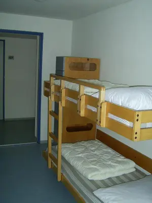 Ein Bett oder Betten in einem Zimmer der Unterkunft Jugendherberge Karlsruhe