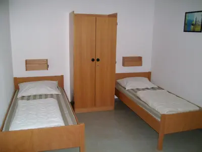 Ein Bett oder Betten in einem Zimmer der Unterkunft Jugendherberge Karlsruhe
