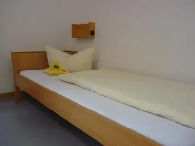 Ein Bett oder Betten in einem Zimmer der Unterkunft Jugendherberge Heidelberg International