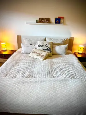 Ein Bett oder Betten in einem Zimmer der Unterkunft Schwarzwald Boutique-Apartment HAUS REHGARTEN