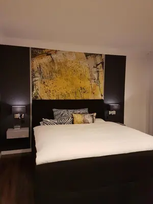 Ein Bett oder Betten in einem Zimmer der Unterkunft A&M Apartment Ahorn/Hohenstadt
