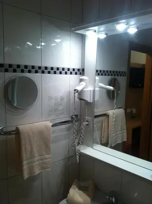 Ein Badezimmer in der Unterkunft Tauberhotel Kette