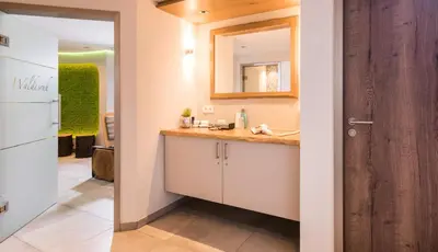 Ein Badezimmer in der Unterkunft Hotel Monika