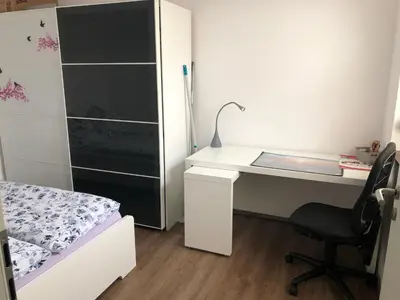 Ein Bett oder Betten in einem Zimmer der Unterkunft Ferienwohnung Janson